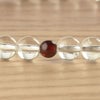 数珠 たまのお 水晶7mm ガーネット仕立 正絹頭付
